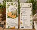 A Diamond Field Blooms Sweet Melon seed packet and its corresponding planting guide card are displayed on a rustic wooden surface next to a potted plant and burlap. The cream-colored cards feature illustrations of a cantaloupe melon, green leaves, and yellow flowers, with the brand 'Diamond Field Blooms' clearly visible.